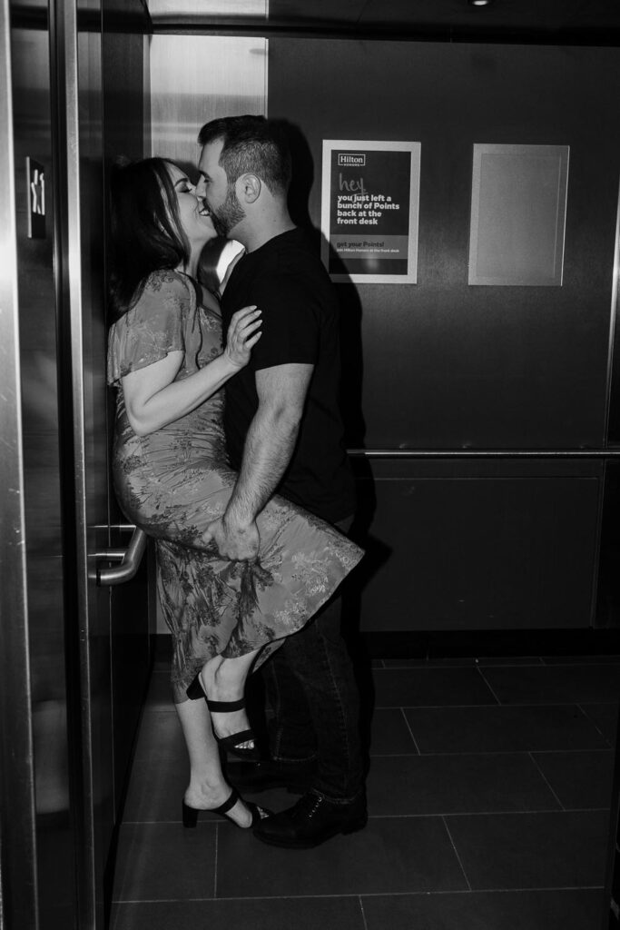 couple kissing in an elevator portsmouth nh engagement shoot black and white