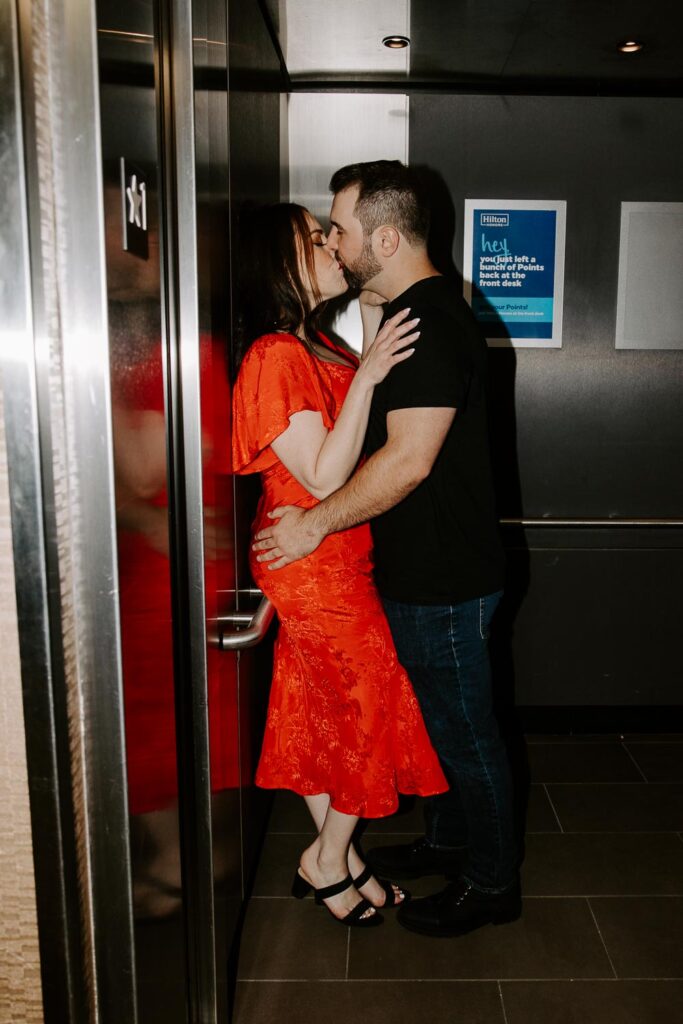 couple kissing in an elevator portsmouth nh engagement shoot