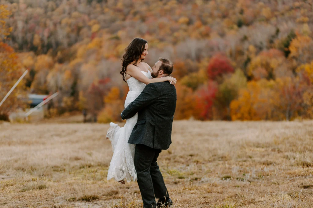 A couple together in autumn light at Sunday River in Maine